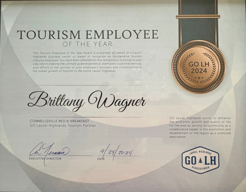 Certificate recognizing Brittany Wagner as the 2024 Tourism Employee of the Year in the Laurel Highlands.